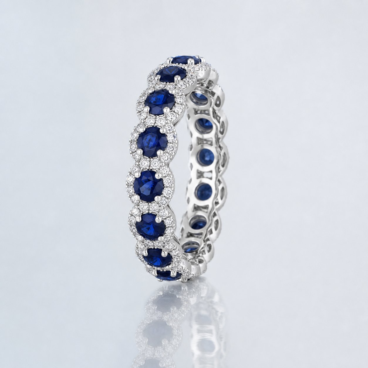 Sapphire and diamond eternity band in white gold
