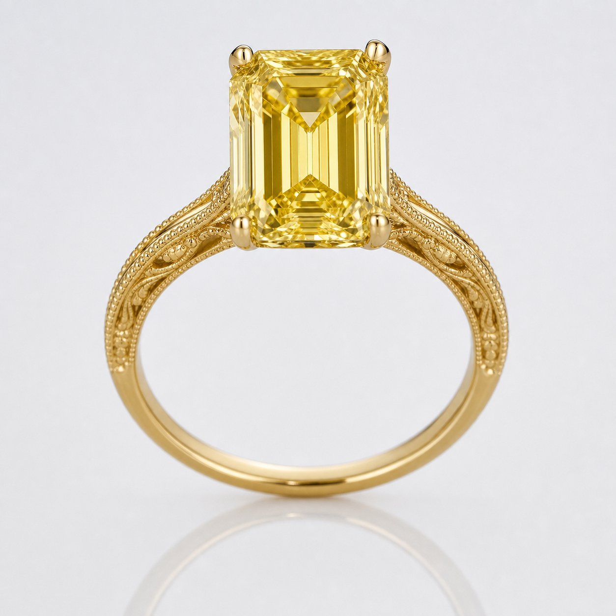 Emerald cut golden diamond ring in yellow gold