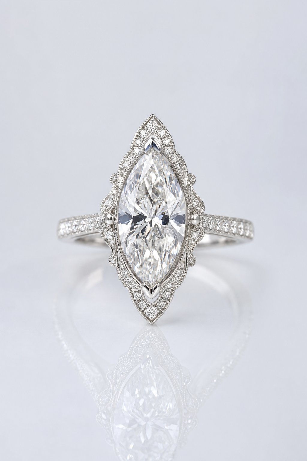 Vintage marquise diamond ring with milgrain detail